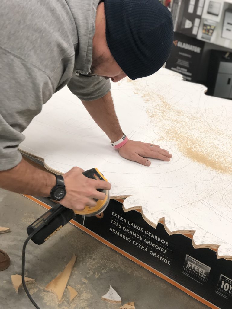 Sanding Photo Prop for Murray State Backdrop