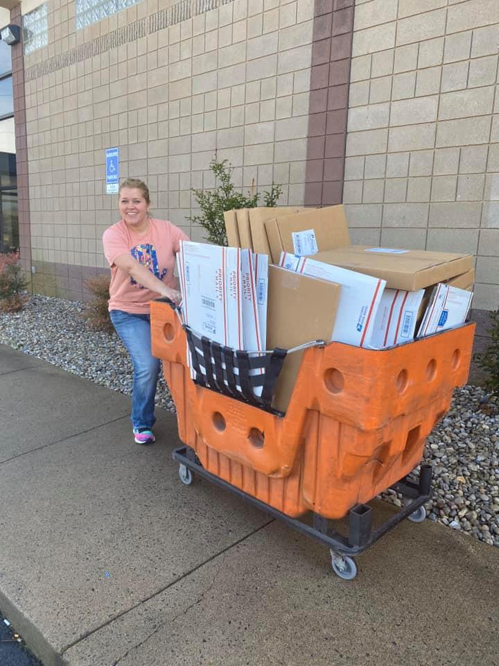 Shipping door hangers at the post office