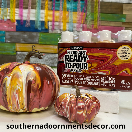 Paint pouring on styrofoam pumpkins with Decoart Fluid Art Ready-To-Pour Acrylic