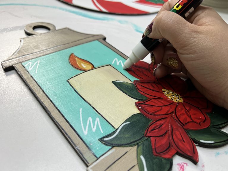 Posca Paint Pen being used to add details to the Christmas lantern