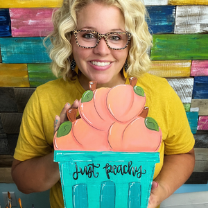 Tamara holding peach basket hanger