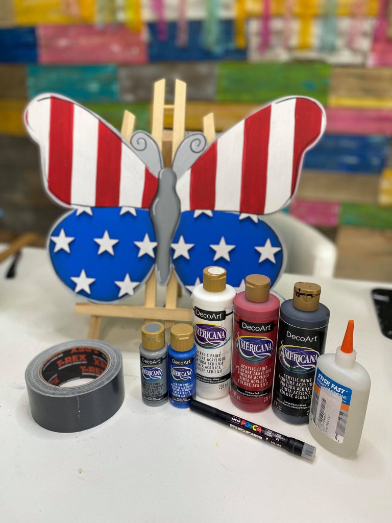 supplies used to paint the patriotic butterfly door hanger