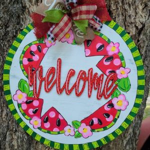 Welcome door hanger with watermelons along edge and bow