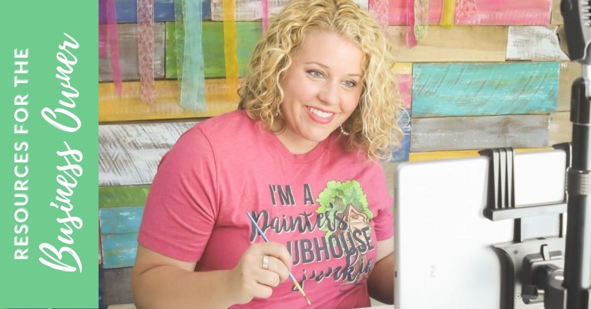 Tamara sitting at her craft desk in front of a camera mount