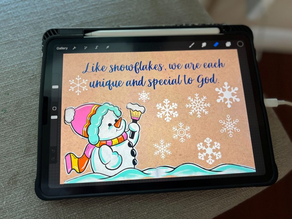 snowman banner design on ipad screen