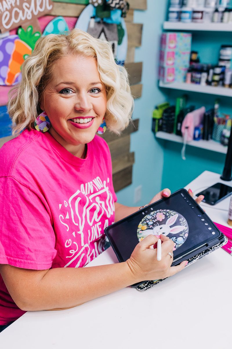 Tamara painting at her desk